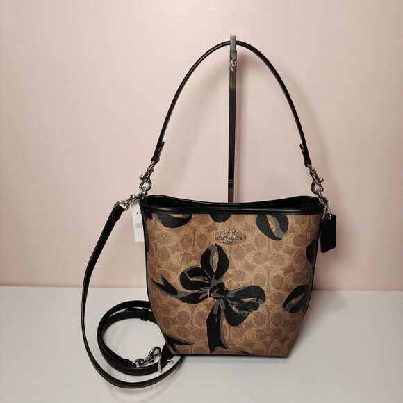 NWT Coach CY651 City Bucket Bag In Signature Canvas With Bow Print Black - Picture 1 of 6
